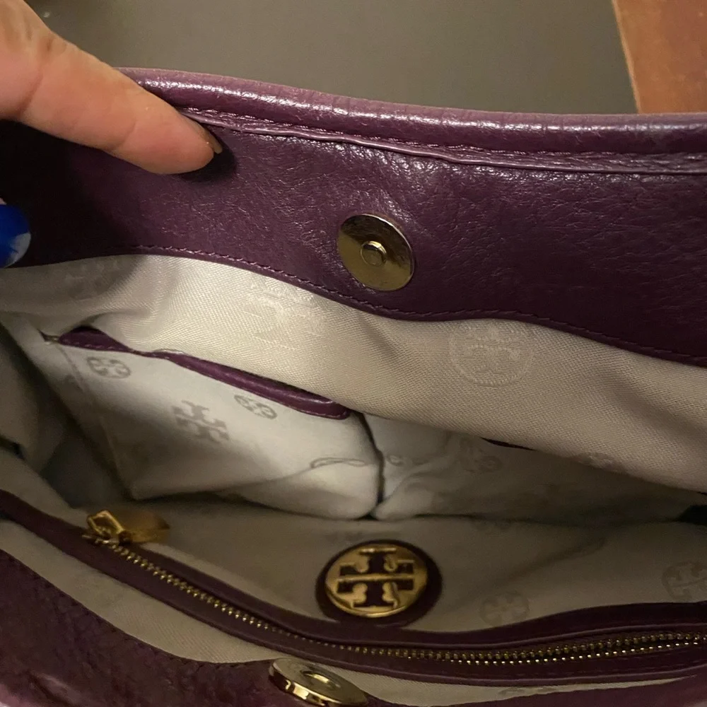 Tory Burch purple bag.